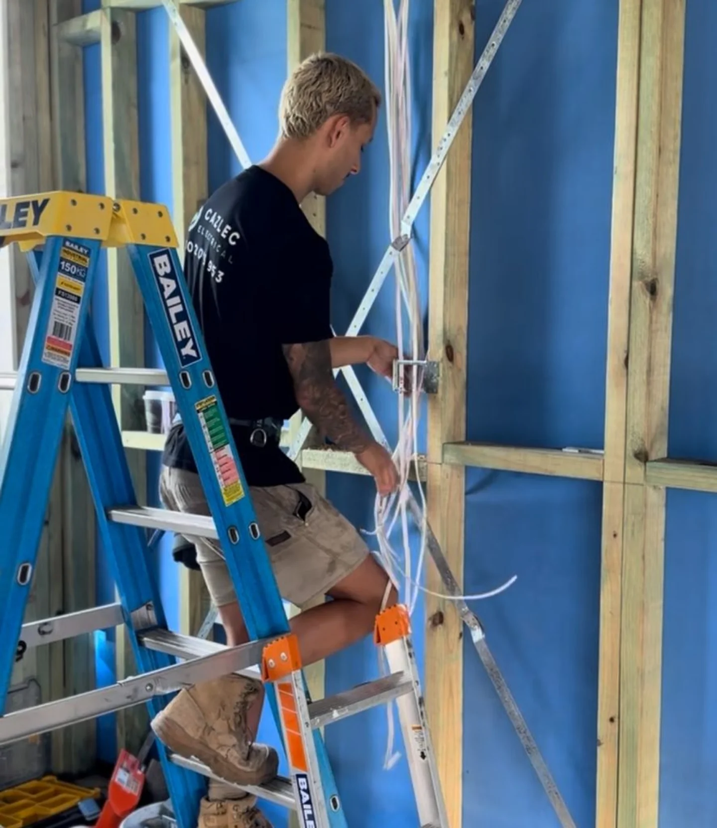 Cazlec Electrical electrician working on wiring during a Newcastle job
